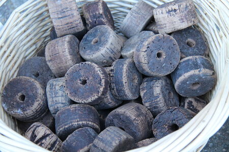 A Basket Holding a Collection of Fishing Net Floats の写真素材