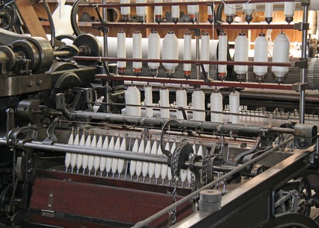 The Bobbins and Threads on a Classic Textile Machine.