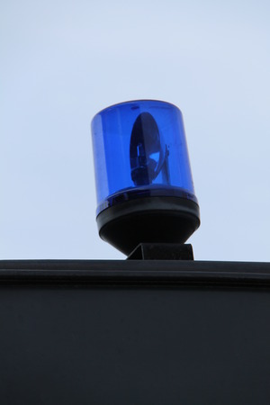 An Emergency Blue Flashing Light on a Rescue Vehicle.の写真素材