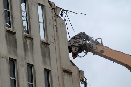 The Jaws of an Excavator Demolishing a Building.の写真素材