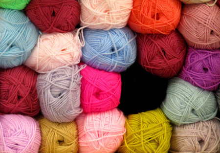 A Display of Brightly Coloured Knitting Wool Balls.の写真素材