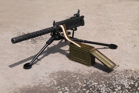 An Army Vintage Machine Gun with Bullet Ammunition.