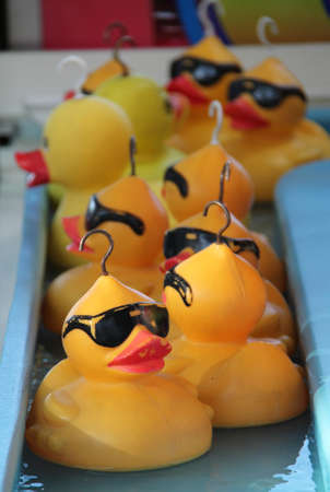 Decorated Plastic Ducks on a Fun Fair Side Show Game.