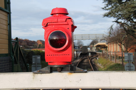 The Red Warning Light on a Vintage Railway Level Crossing.