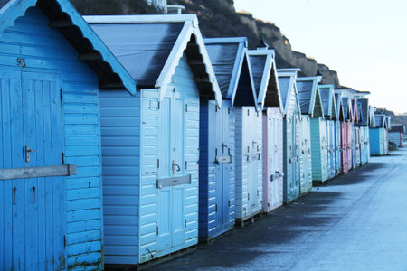 A Row of Traditional Wooden Beach Huts at the Seaside.