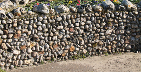 A Flint Stone Boundary Wall with Drainage Holes.の写真素材