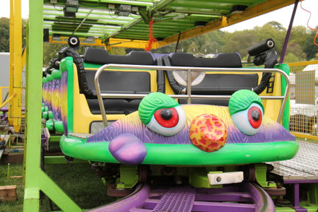 The Riding Carriages of a Fast Fun Fair Ride.の写真素材