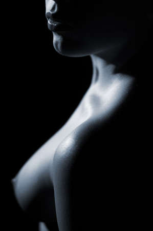Sensual women body parts in moonlitht shadowの写真素材