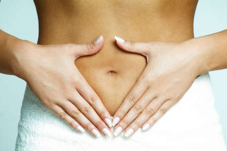 Woman's Fingers Touching her body partsの写真素材