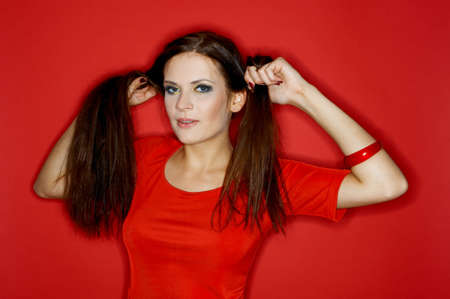 Portrait of Young woman isolated on colour background