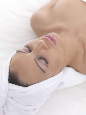 Portrait of beautiful woman during spa treatmentの写真素材