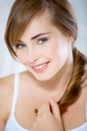 Portrait of cute and happy teenage girl の写真素材