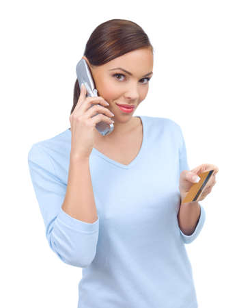 Portrait of beautiful woman with credit cardの写真素材
