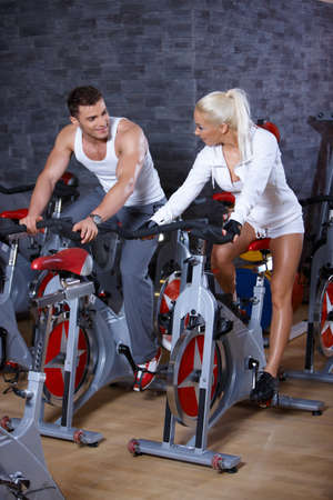 Sporty couple exercising at the gymの写真素材