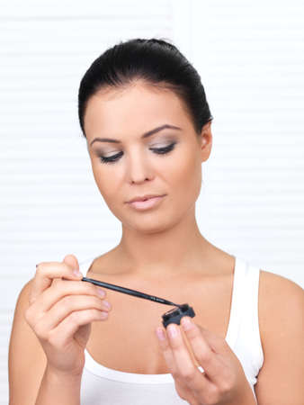 Portrait of beautiful woman, she doing makeupの写真素材
