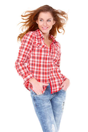 Lovely young woman in casual clothing, white backgroundの写真素材