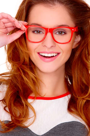 Portrait of young woman wearing modern glasses on whiteの写真素材