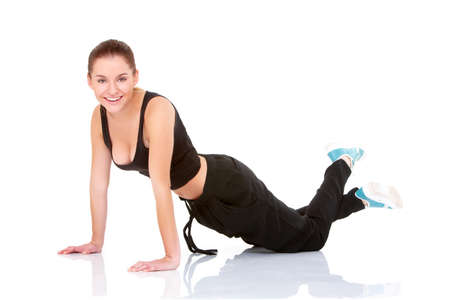 beautiful fitness woman doing exercise on whiteの写真素材