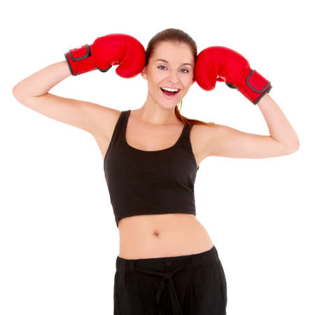Beautiful sporty woman with boxing gloves on whiteの写真素材