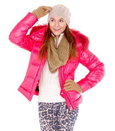 Cute young woman wearing winter jacket scarf and capの写真素材