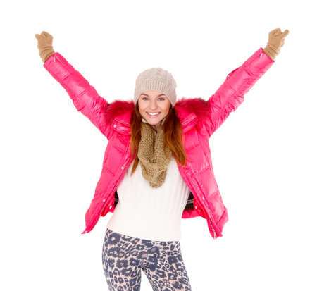 Beautiful young woman wearing winter jacket scarf and capの写真素材