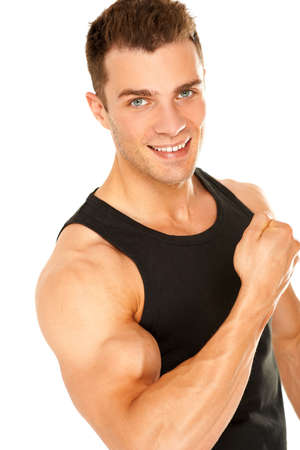 Handsome muscular young man isolated on white backgroundの写真素材
