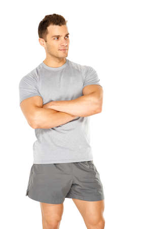 Healthy muscular young man. Isolated on white backgroundの写真素材