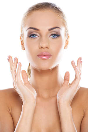 Head and shoulders of a gorgeous nude woman isolatedの写真素材