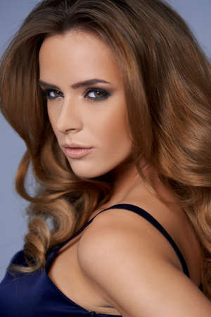 Close up portraif of young glamour lady wearing navy dessの写真素材