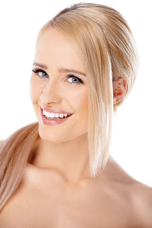 Positive beautiful blond woman  smiling over white bacgroundの写真素材