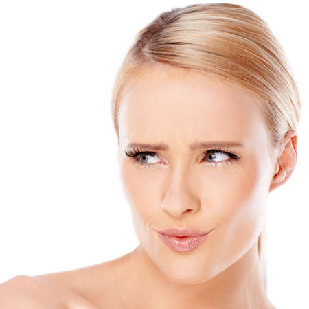 Portrait of blond woman  she is looking at her right  isolated on white backgroundの写真素材