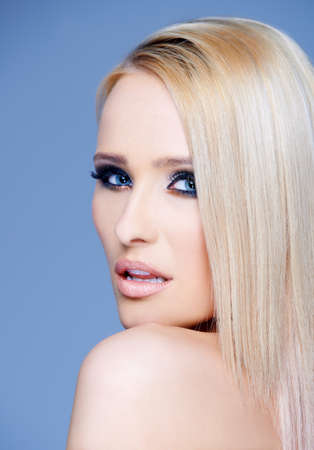 Side view portrait of blond sexy woman with dark glamour makeupの写真素材
