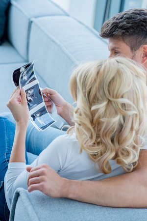 Caucasian Lovers on Couch Looking Nice Pictures