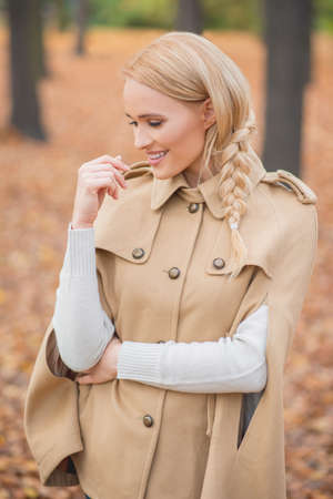 Pretty Young Female in Brown Autumn Fashionの写真素材