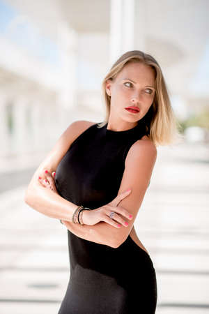 Adorable Woman in Black Sexy Dress Posing in Malaga Harbour