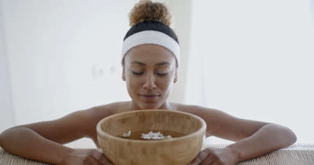 Woman taking spa treatments and relaxation therapy. Slow Motion Shot.の写真素材