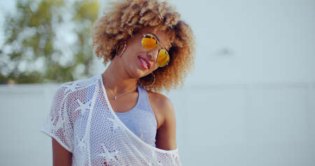 Sexy Girl Shaking Her Big Afro Haircutの写真素材