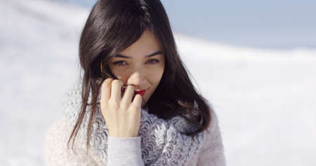 Happy cute asian girl enjoying her winter timeの写真素材