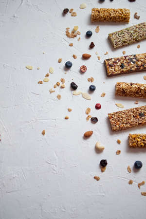 Composition of healthy raw dessert snack. Fitness dietary food. Homemade protein energy natural bars...