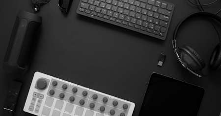 Audio producer concept. Various digital recording audio music gadgets placed on black background.の写真素材