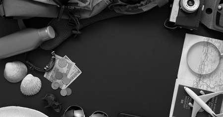 Travel and Tourist concept. Vacation and travel accessories placed on black background.の写真素材