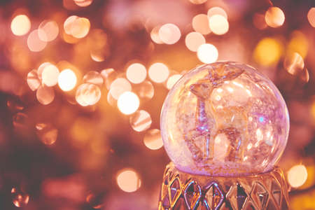 Closeup of Christmas tree decorations. Selective focus with retro faded colorsの写真素材