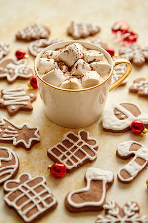 Cup of hot chocolate and Christmas shaped gingerbread cookiesの写真素材