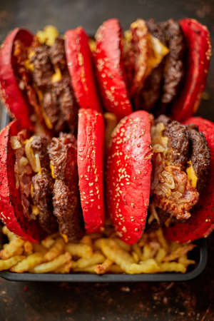 Burgers placed on french friesの写真素材