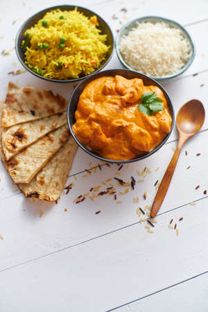 Fresh and tasty Butter Chicken served in ceramic bowl. Indian traditional dishの写真素材