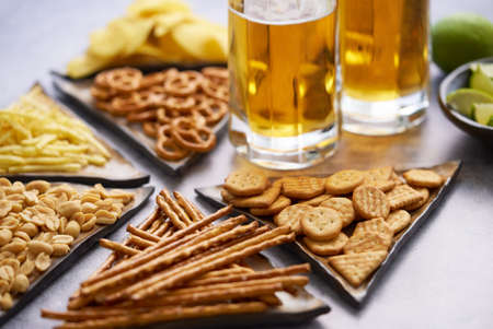 Delicious beer snacks on the tableの写真素材