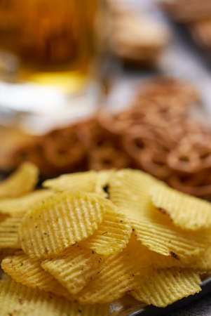 Salty Potato chips served on a plateの写真素材