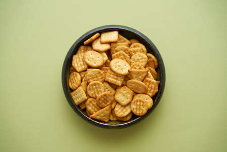Top view of bowl with salty crackersの写真素材