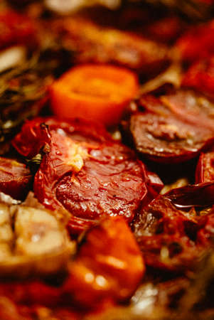 Close up shot of Various kinds of roasted red and yellow tomatoesの写真素材