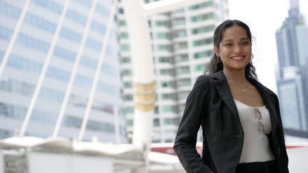 Cheerful Young Businesswoman Enjoying City Lifeの写真素材